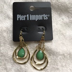 Earrings with green stone